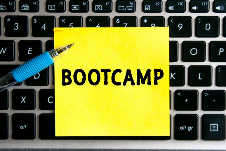 Illustration of "bootcamp" sticky note on keyboard