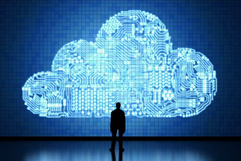 Man standing in front of cloud computing image