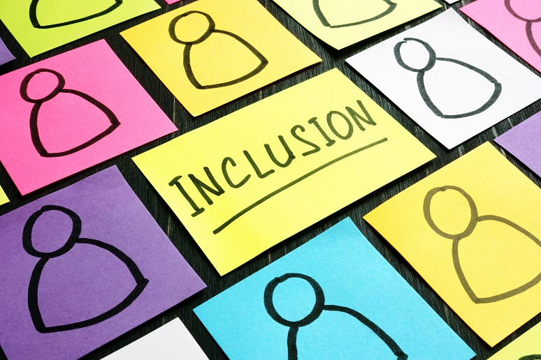 Inclusion written on a Post-It note