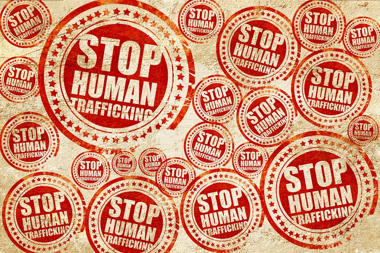 Stamps that say "stop human trafficking"