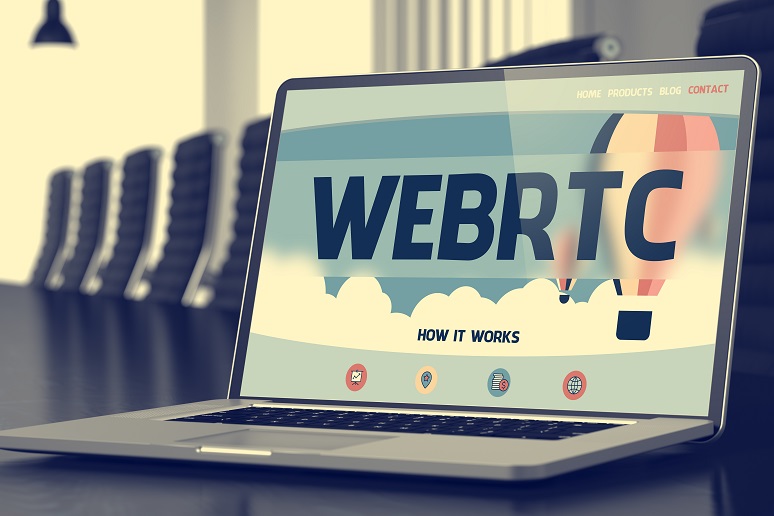 A laptop with the words WebRTC on it