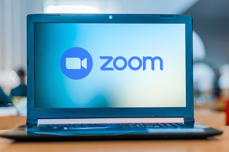A laptop with Zoom on it