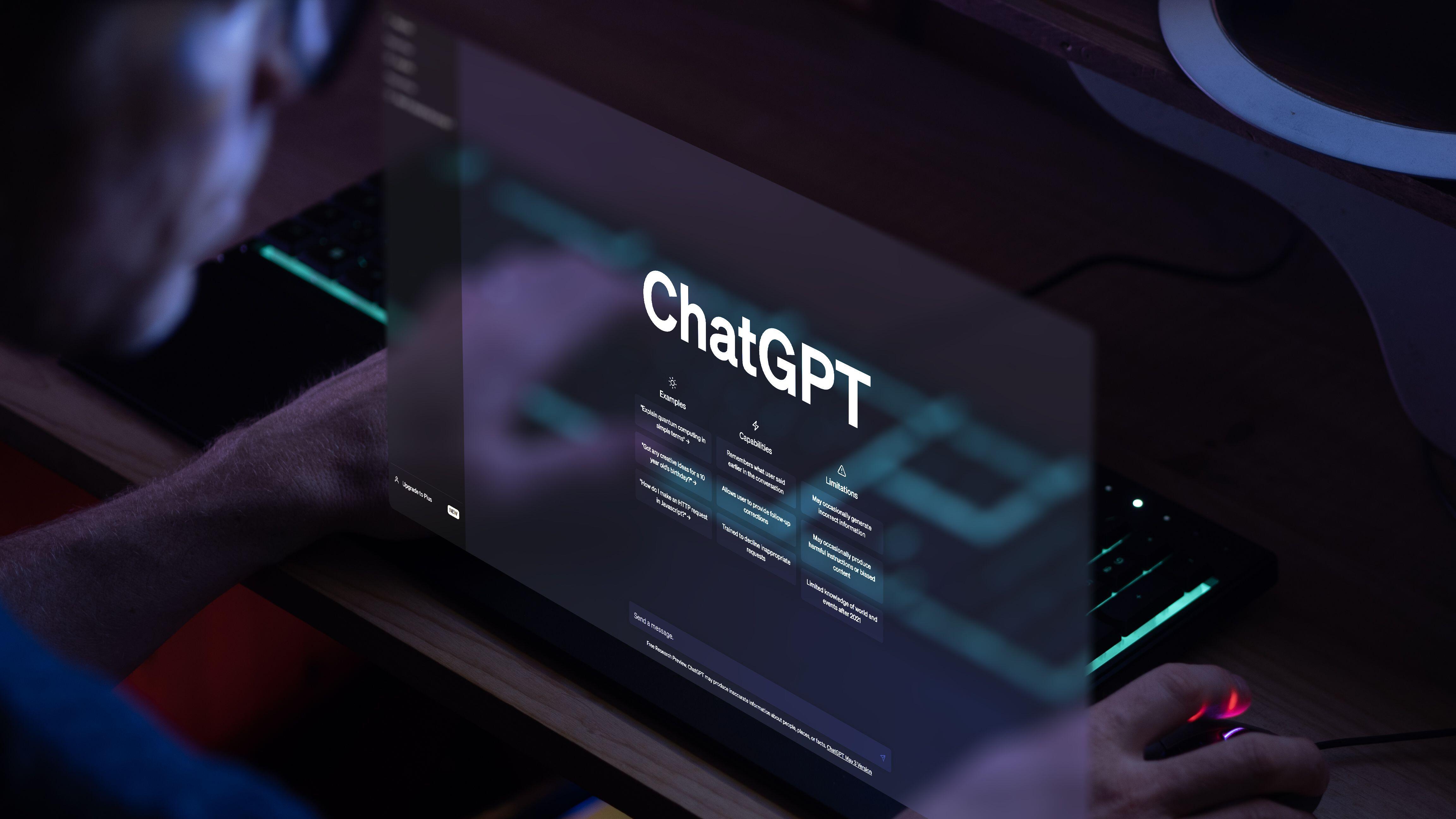 Person looking at screen that reads 'ChatGPT'