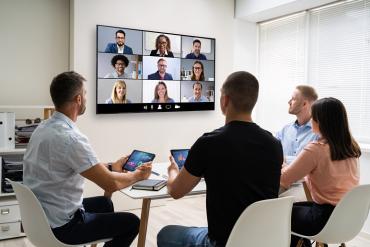 Hybrid in-office, remote collaborative video  meeting