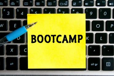 Illustration of "bootcamp" sticky note on keyboard