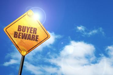 Photo of buyer beware sign