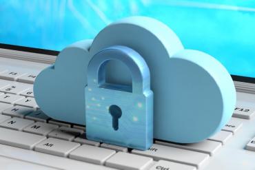 Photo of Blue cloud and padlock on a computer