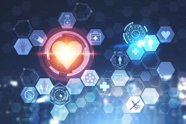 A healthcare technology graphic with a heart and apps