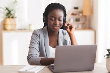 Photo of contact center agent working from home