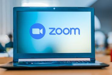 A laptop with Zoom on it