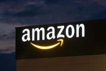 Amazon.com warehouse sign at night